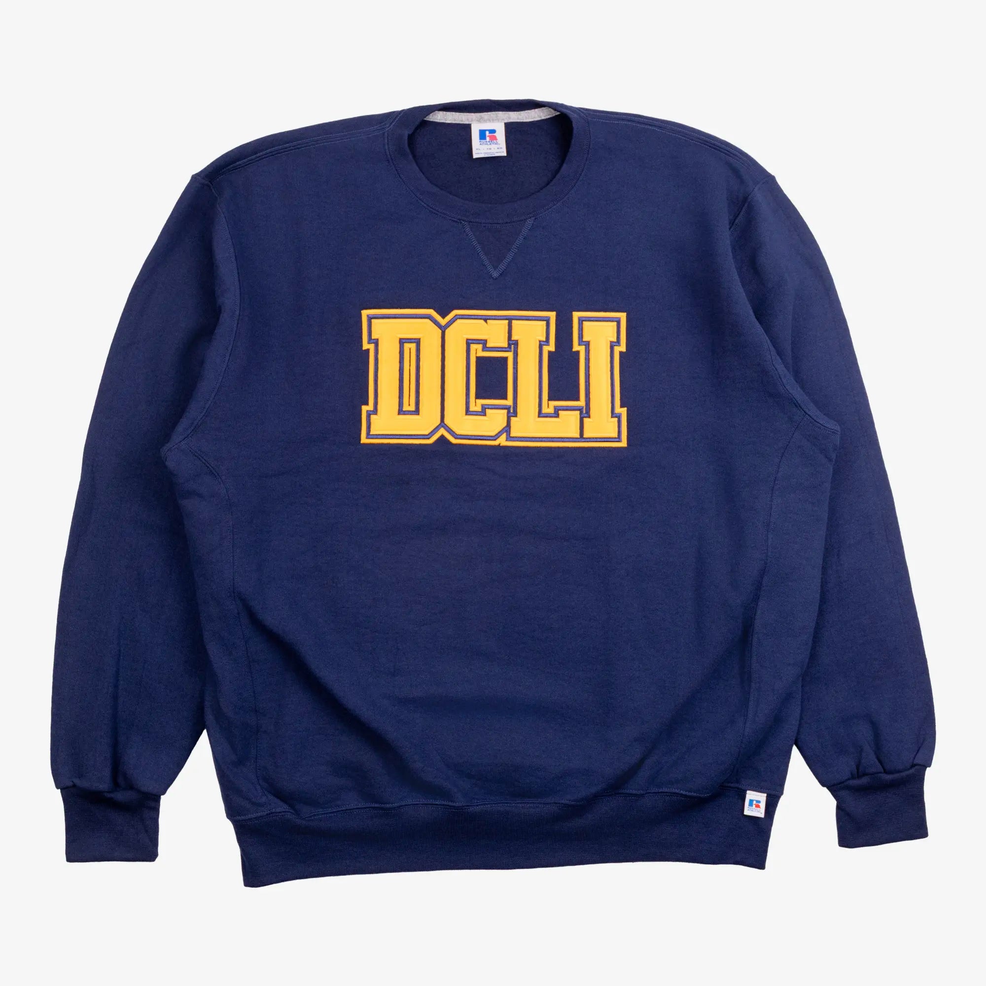 Box of American university sweatshirts