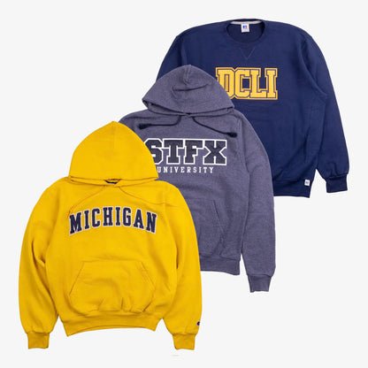 Box of American university sweatshirts